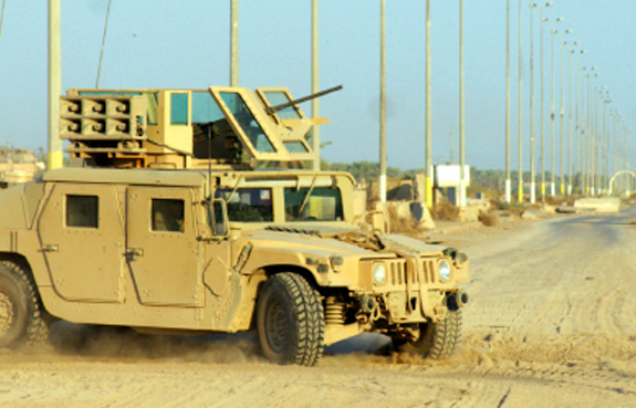 A military vehicle stationed and ready.